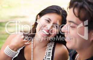 Attractive Hispanic Couple At The Park