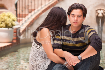 Attractive Hispanic Couple During A Serious Moment