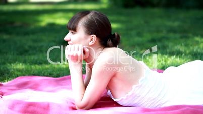 Woman lying in the park and relaxing
