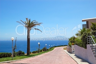 Road near luxury villas and Aegean Sea view, Crete, Greece