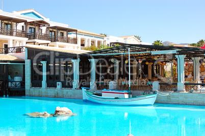 Sailboat in swimming pool at restaurant in luxury hotel, Crete,