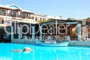 Sailboat in swimming pool at restaurant in luxury hotel, Crete,