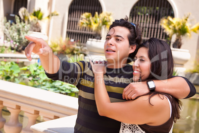 Attractive Hispanic Couple Enjoy the Outdoors