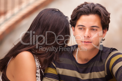 Attractive Hispanic Couple During A Serious Moment