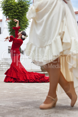 Two Traditional Women Spanish Flamenco Dancers In Town Square