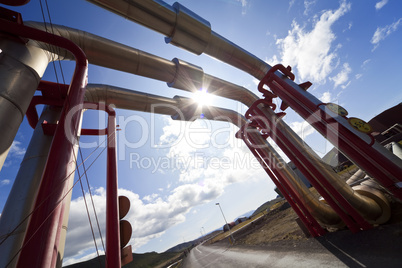 Industrial Pipeline Going Up and Over A Road