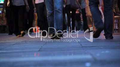 Pedestrians feet walking in city - Crowded Pavement