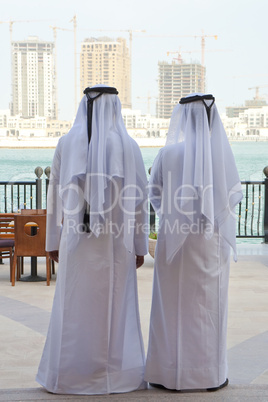Two Anonymous Arab Men Looking At Construction of New Buidings