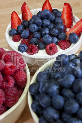 Bowl of Blueberries, Raspberries and Strawberries In Yogurt