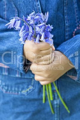 Mixed Race African American Little Girl With A Bunch of Bluebell