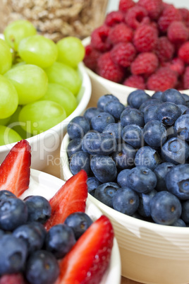 Bowls of Healthy Breakfast Blueberries Raspberries Strawberries