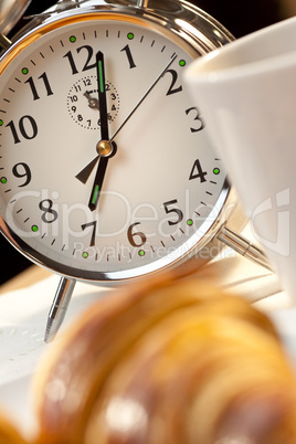 Alarm Clock and Continental Breakfast of Croissant & Coffee