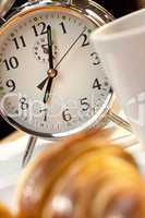 Alarm Clock and Continental Breakfast of Croissant & Coffee