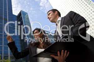 Interracial Male and Female Business Team In Modern City