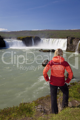 Woman Tourist At Godafoss Waterfall, Iceland