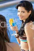 Beautiful Hispanic Latina Woman Drinking A Cocktail With Her Fri