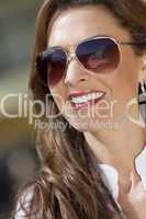 Portrait of A Beautiful Young Woman Wearing  Aviator Sunglasses