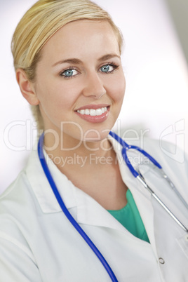 Attractive Smiling Blond Woman Doctor With Stethoscope