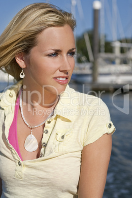 Beautiful Young Blond Woman By The Sea