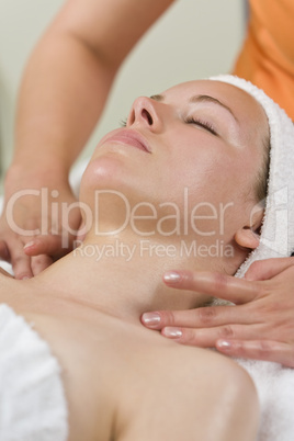 Young Woman Having Facial Treatment or Massage at Health Spa