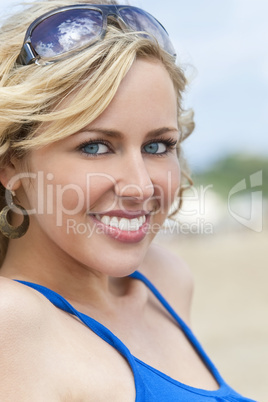 Beautiful Young Blond Woman Smiling At The Beach