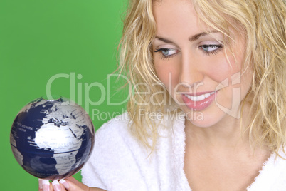 Beautiful Blonde Woman With Globe On Green Background