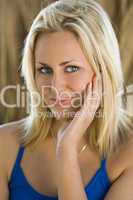 Smiling Beautiful Young Blond Woman With Blue Eyes