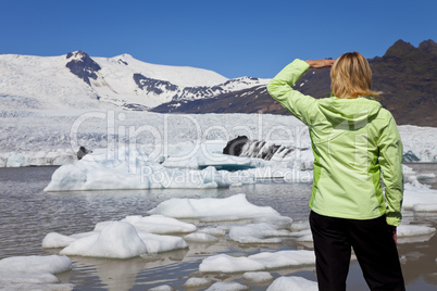 Environmental Concept Woman Hiker Looking At Melting Glacier