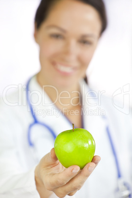 Female Doctor Holding Green Apple