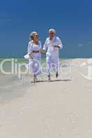 Happy Senior Couple Running Holding Hands on A Tropical Beach