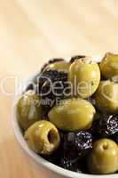 A Bowl of Stuffed Green and Black Olives