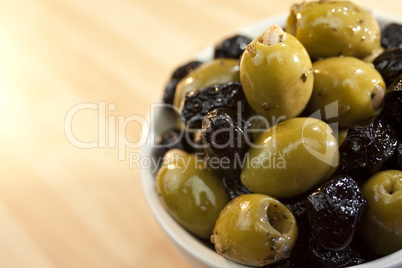 A Bowl of Stuffed Green and Black Olives