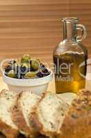 Olive Oil, Stuffed Green and Black Olives and Rustic Bread
