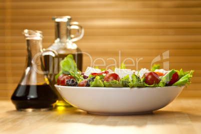Salad With Olives, Cheese, Olive Oil and Balsamic Vinegar Dressi