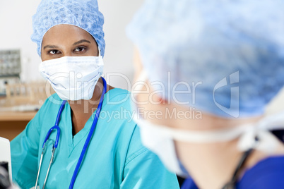 Asian Female Scientist With Her Colleague in Laboratory