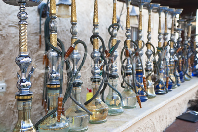 Arabic Shisha Waterpipes Lined Up In A Restaurant