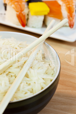 Rice and Chopsticks With Sushi