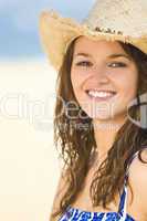 Beautiful Smiling Brunette Girl in Straw Cowboy Hat