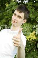 Teenager sign thumbs up