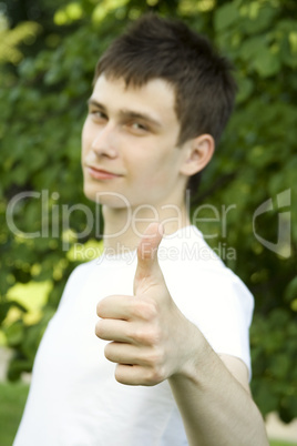 Teenager sign thumbs up