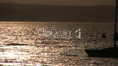 Boats pass on a sunlit sea, Puget Sound, Seattle