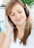 Attractive woman listening music with headphones