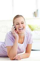 Laughing woman talking on phone