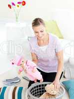 Smiling woman doing housework