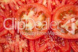 Background of peaces of red tomato