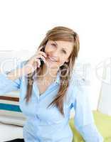 Positive businesswoman talking on phone