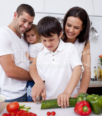 Jolly family cooking together