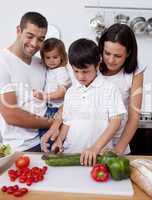 Cheerful family cooking together