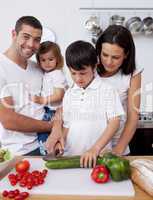 Young family cooking together