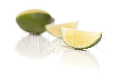 Sliced Lime on Reflective White Surface